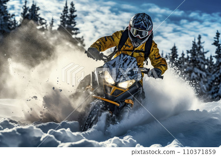Athlete on a snowmobile moving on the snow 110371859