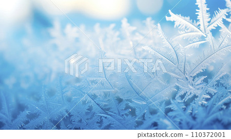 Abstract ice textures on a window in winter Abstract ice textures on a window in winter 110372001