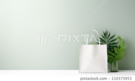 Layout for the design of a simple white canvas shopping bag with green plant leaves Layout for the design of a simple white canvas shopping bag with green plant leaves 110373953