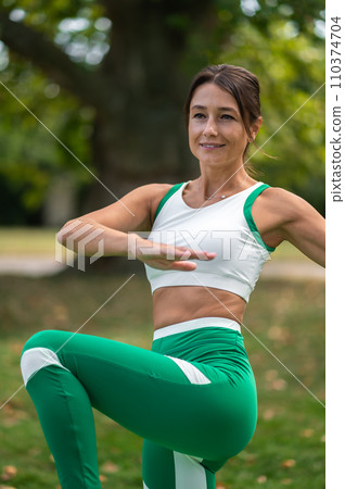 Young woman doing exercises on core and abs Young woman doing exercises on core and abs 110374704
