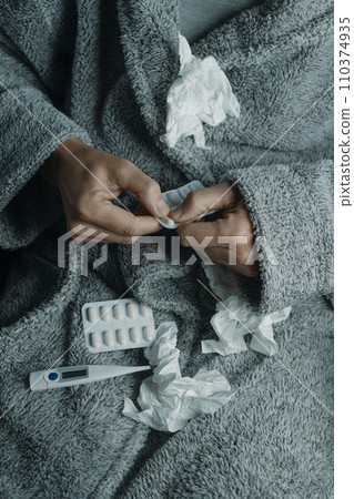 ill caucasian man at home is about to take a pill ill caucasian man at home is about to take a pill 110374935