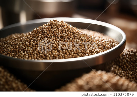 Quinoa groats in a wooden plate 110375079