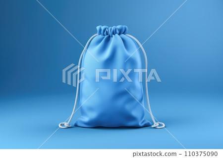 Blue fabric bag on a blue background Blue fabric bag on a blue background 110375090