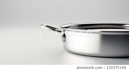Deep stainless steel frying pan insulated on a white background 110375149