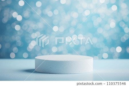 Empty round cylinder platform podium for product or cosmetics presentation on blue background with bokeh. Minimal composition background. Front view Empty round cylinder platform podium for product or cosmetics presentation on blue background with bokeh. Minimal composition background. Front view 110375546