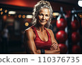 Portrait of athletic gray hair woman working out in gym . Fitness and bodybuilding concept 110376735