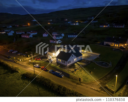 Aerial night view of Glencolumbkille in County Donegal, Republic of Irleand 110376838