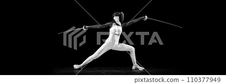 Banner. Striking profile of two-sword-wielding sportswoman, radiating power and grace against black studio background with copy space for text. Banner. Striking profile of two-sword-wielding sportswoman, radiating power and grace against black studio background with copy space for text. 110377949