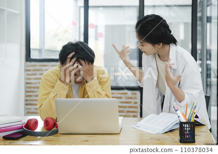 Two colleagues arguing at work. Colleagues arguing in office, problems at work... 110378034