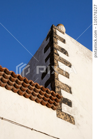 Corner of a white house, blue sky, Canary Islands, Spain Corner of a white house, blue sky, Canary Islands, Spain 110378227