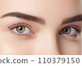 Close-up of the eyes of a young woman with makeup. Concept of natural cosmetics and eye look. "AI image generation" 110379150