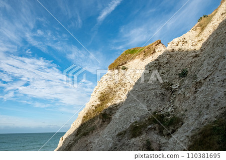Majestic Chalk Cliffs Under a Wispy Sky Majestic Chalk Cliffs Under a Wispy Sky 110381695