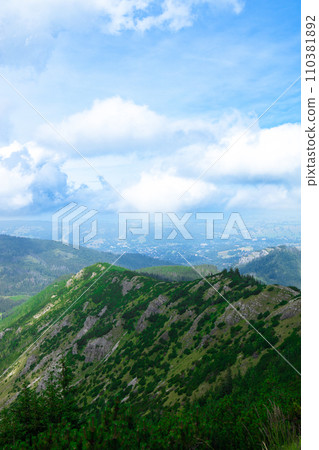 Mountain panorama of the Tatra Mountains from Kasprowy Wierch (Kasper Peak) on a summer day in Poland Mountain panorama of the Tatra Mountains from Kasprowy Wierch (Kasper Peak) on a summer day in Poland 110381892