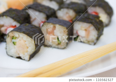 Japanese cuisine, rice sushi and fish - closeup 110382327