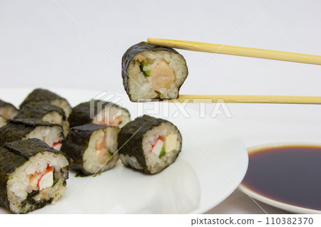 Japanese cuisine, rice sushi and fish - closeup 110382370