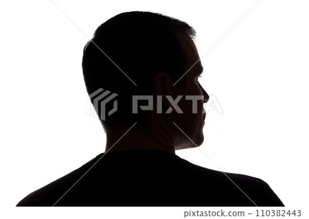 Portrait of a young man, back view - dark isolated silhouette 110382443