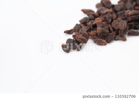 Dry raisins white background Dry raisins white background 110382706
