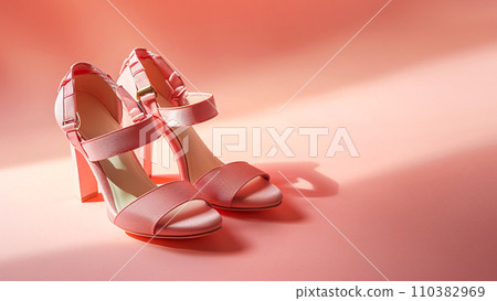 Pink female high heel shoes on pink background. Fashion, wedding, party and advertising concept. Elegant pink shoes, woman accessories, creative minimal background Pink female high heel shoes on pink background. Fashion, wedding, party and advertising concept. Elegant pink shoes, woman accessories, creative minimal background 110382969