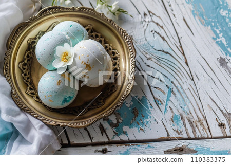 Blue golden bath bombs on weathered white table, spa arrangement Blue golden bath bombs on weathered white table, spa arrangement 110383375