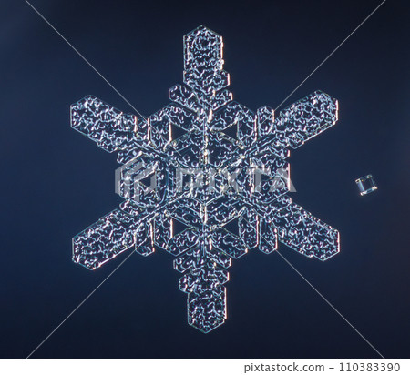 Natural snowflake crystal close-up macro photo 110383390