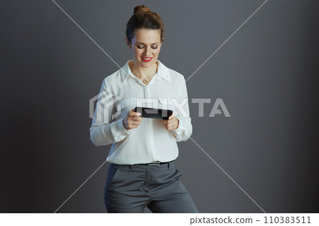 business owner woman driving growth of social media using phone 110383511