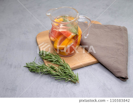 Refreshing summer homemade cocktail with grapefruit and rosemary. Refreshing summer homemade cocktail with grapefruit and rosemary. 110383842