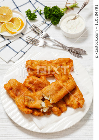deep fried crispy beer batter fish fillet on plate deep fried crispy beer batter fish fillet on plate 110384791