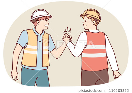 Two men in uniform of builders shake hands holding each others palms tightly.. Vector image 110385253