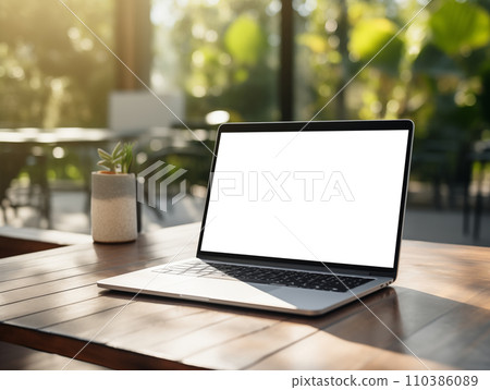 AI-generated content. Laptop screen mockup, white isolated empty computer screen, open laptop standing on table with tropical green plants 110386089