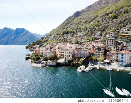 Aerial drone photo of iconic small port and fishing village boats Aerial drone photo of iconic small port and fishing village boats 110386944