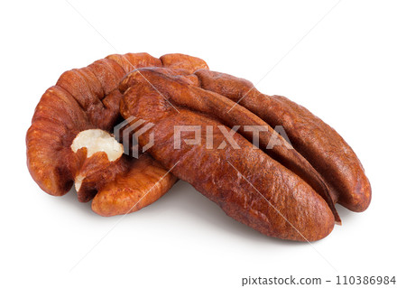 pecan nut half isolated on white background with full depth of field 110386984