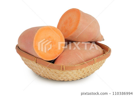 Sweet potato in a wicker basket isolated on white background with full depth of field 110386994