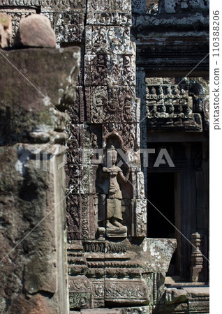 Angkor Wat ruins female statue relief Angkor Wat ruins female statue relief 110388206