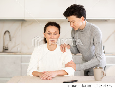 Boy asking mother for forgiveness 110391379