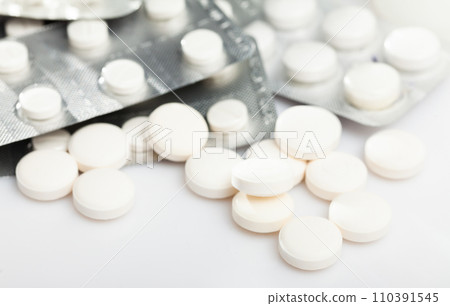 Various pills and capsules 110391545