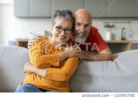 Happy Senior Couple. Romantic Elderly Man And Woman Hugging At Home 110391780
