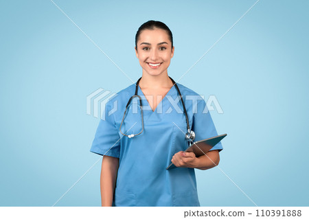 Smiling female doctor with clipboard and stethoscope 110391888