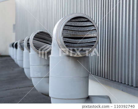 Ventilation pipes are installed on the factory roof. Ventilation pipes are installed on the factory roof. 110392740