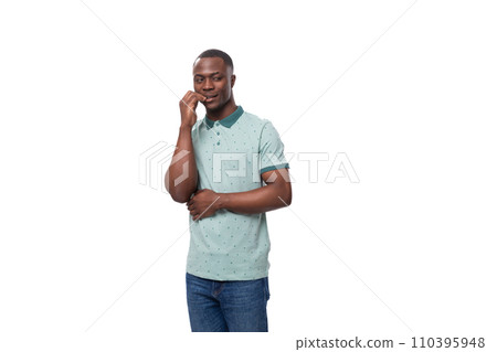 young handsome smiling african man dressed thinking holding his head 110395948