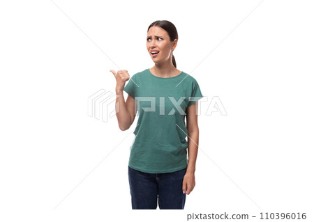 active smiling young caucasian brunette woman in green t-shirt draws attention active smiling young caucasian brunette woman in green t-shirt draws attention 110396016