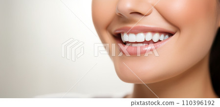 AI-generated content. Perfect white teeth smile of a young woman, close up 110396192