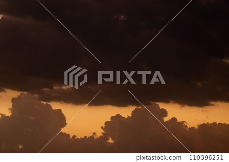 Orange, Black and white dramatic sunset sky line  110396251