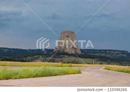 Cloudy days seeing Devils Tower in the summer  110396268