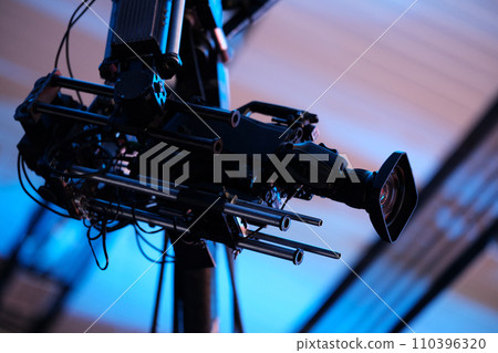 TV camera on a crane at a football match or concert. Close-up live video broadcast camera 110396320