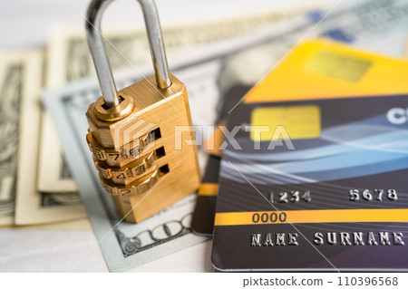 Credit card with password key lock and US dollar banknotes. Credit card with password key lock and US dollar banknotes. 110396568