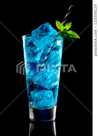 Blue Curacao cocktail garnished with a lime isolated on black background Blue Curacao cocktail garnished with a lime isolated on black background 110399229