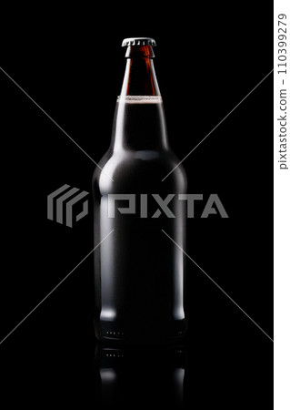 Beer bottle on a dark black background. Bottle with drink like Ipa, Pale Ale, Pilsner, Porter or Stout 110399279