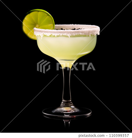 Margarita cocktail in salt-rimmed glass with lime isolated on black background Margarita cocktail in salt-rimmed glass with lime isolated on black background 110399357
