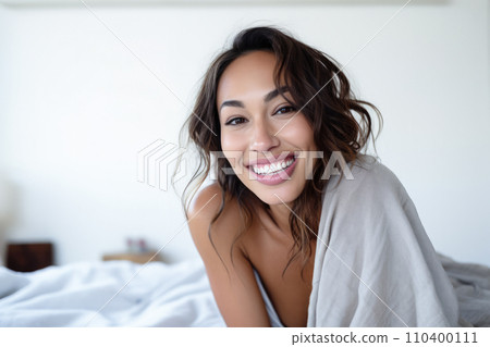 Smiling Asian woman at her home with a positive mood 110400111