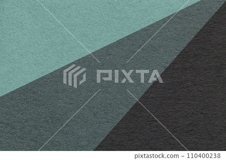 Texture of old craft cyan, teal and black color paper background, macro. Vintage abstract cardboard Texture of old craft cyan, teal and black color paper background, macro. Vintage abstract cardboard 110400238